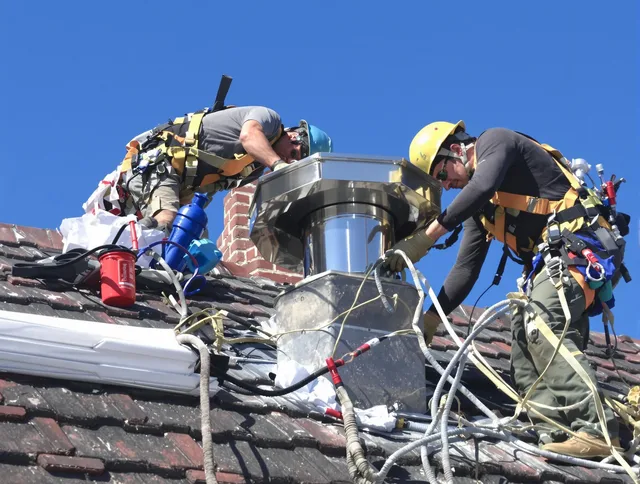 Protective chimney cap installed by Garden Grove Chimney Sweep in Garden Grove, CA